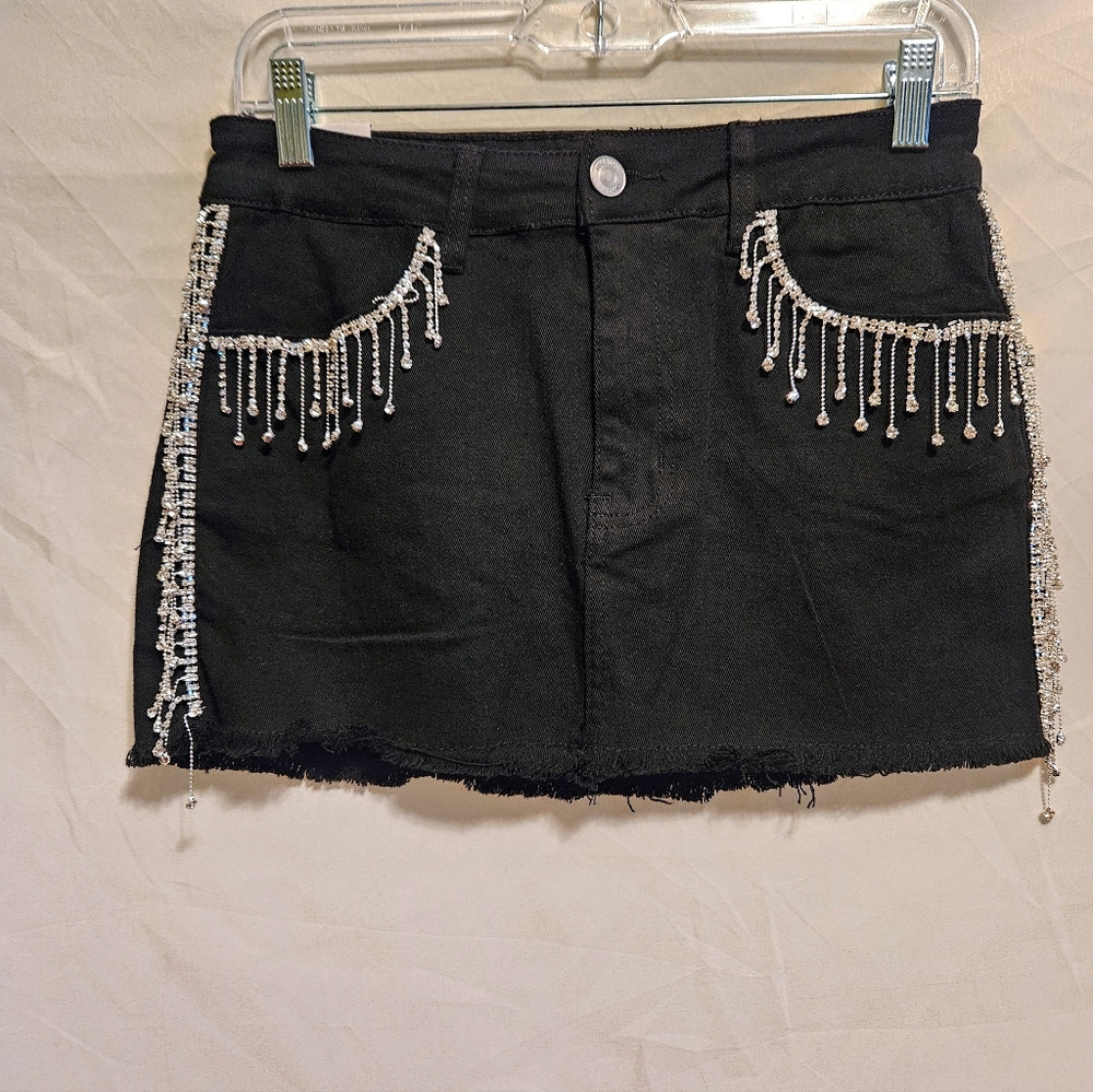 Denim Mini Skirt. Rue 21 Size M, Black with Rhinestones on sides & pockets. NWT